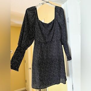 Francesca’s adorable black with white polka dot long cinched sleeve dress.